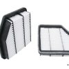 Two clean engine air filters on a white background